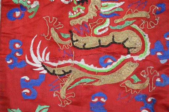 A Chinese embroidered silk dragon robe, early 20th century